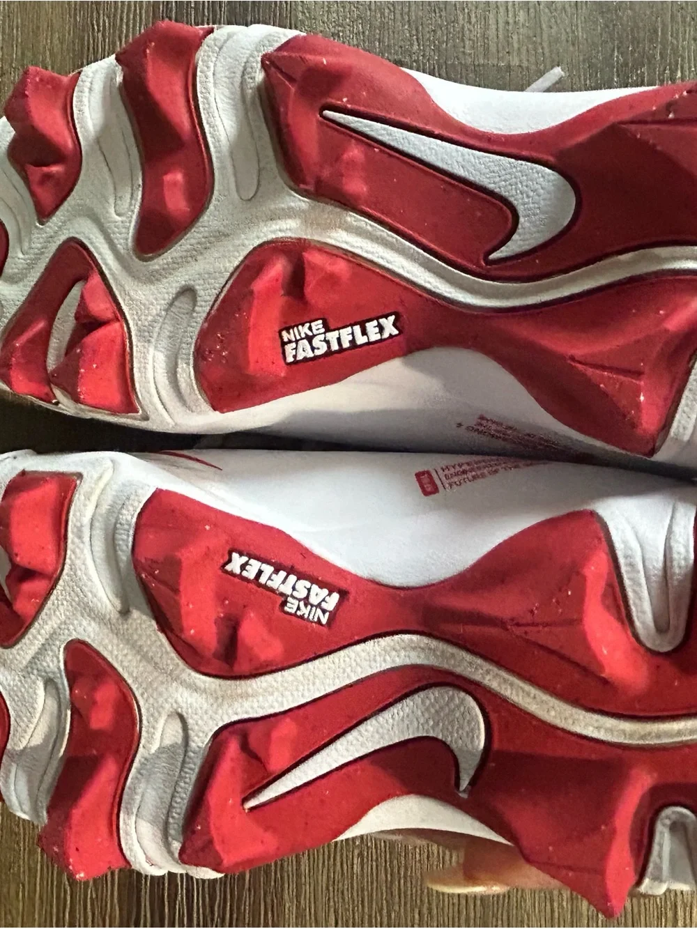 Nike Kids White cleats  with Red and Camo Accents